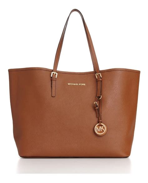 como saber si es original bolsa michael kors|More.